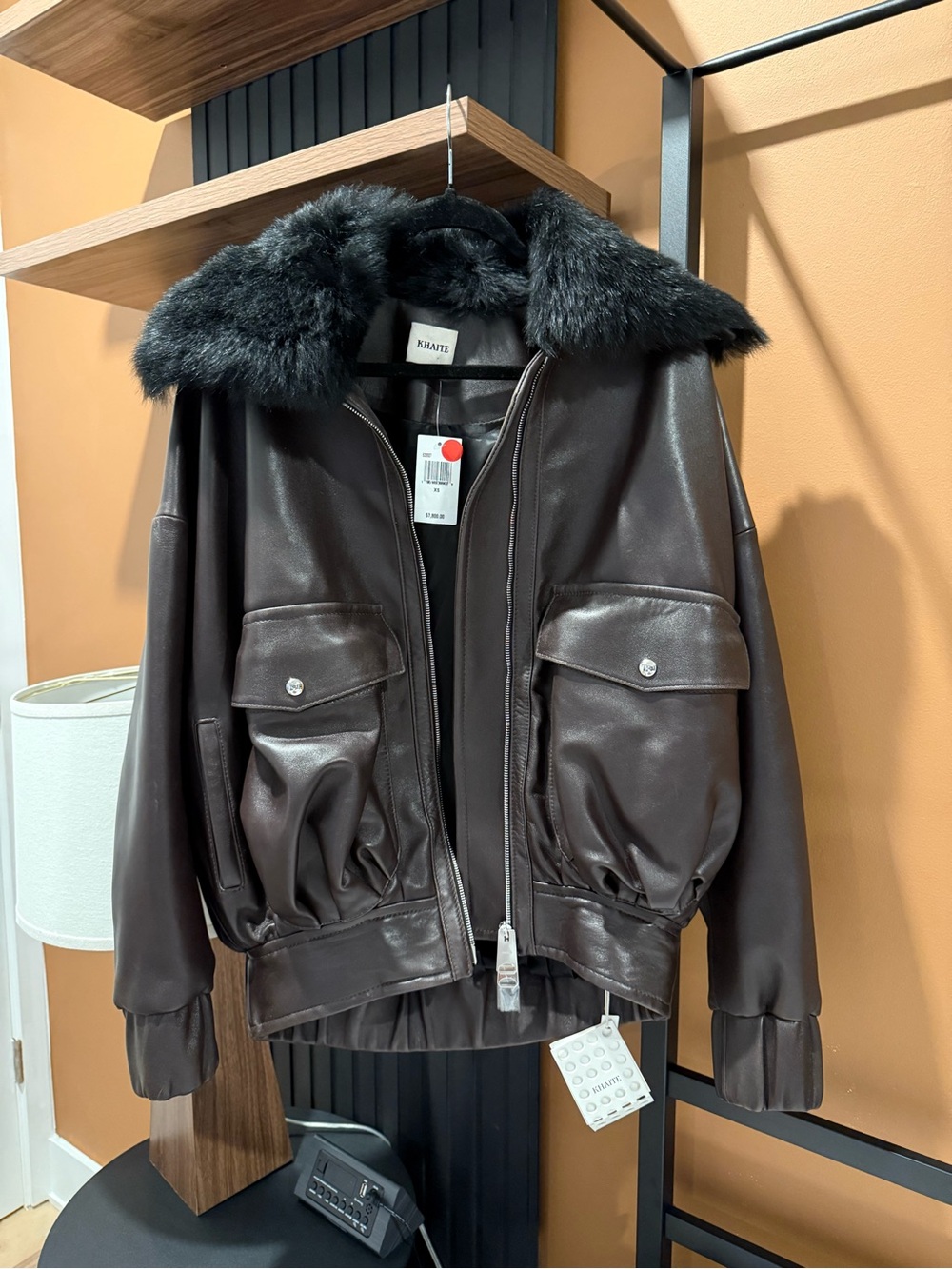 Khaite Daemon oversized shearling trimmed leather jacket